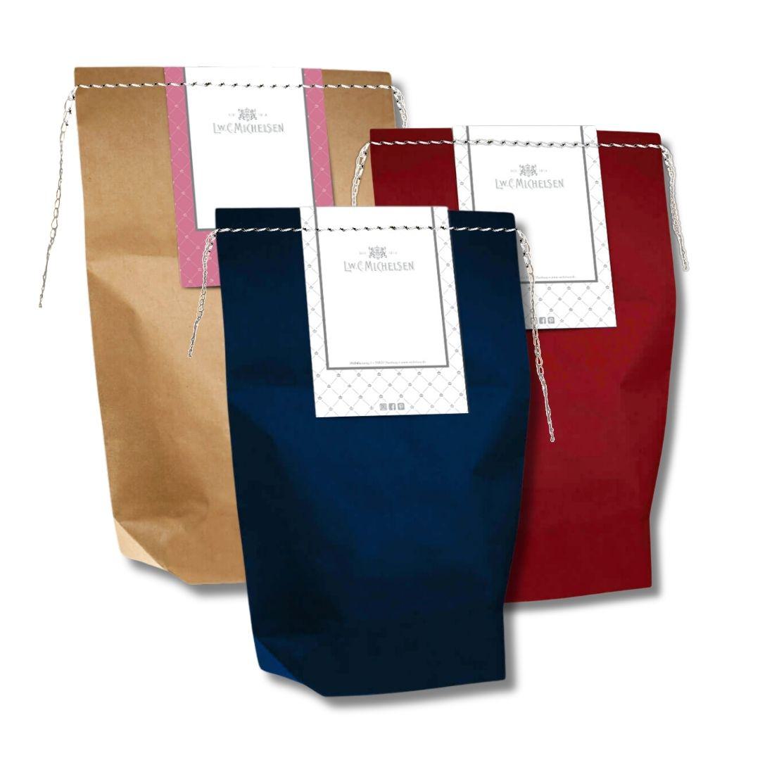 L.W.C. Michelsen Geschenktüten in Braun, Dunkelblau, Weinrot und Rosa