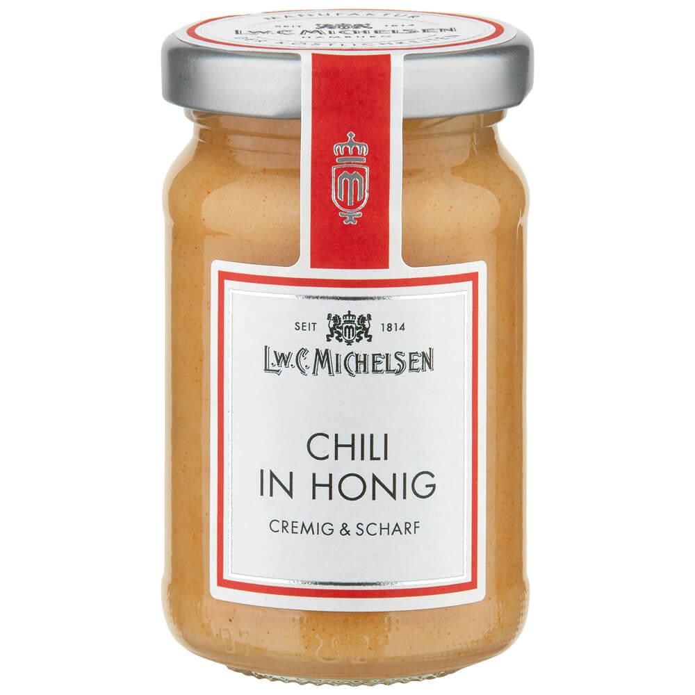 Chili in Honig: Unser Chili in Honig vereint die cremige Süße des Honigs mit der feinen Schärfe von gemahlenem Chili zu...
