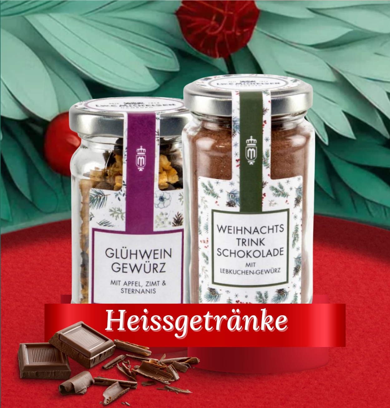 Set mit Glühwein-Gewürz und Weihnachtstrinkschokolade-Gewürz vor weihnachtlichem Hintergrund