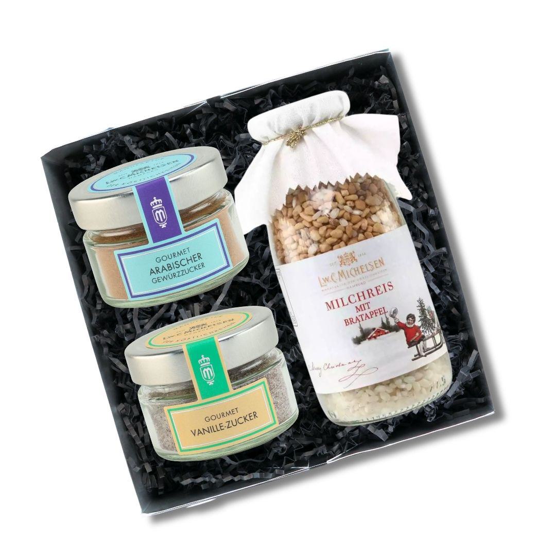 Geöffnete Box: Milchreis mit Bratapfel, Zucker-Gläser