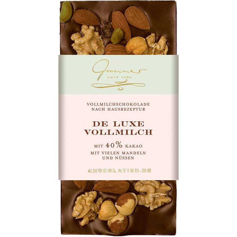 Vollmilchschokolade De Luxe mit Mandeln, Haselnüssen, Walnüssen und Pistazien, handgeschöpft von Confiserie Gmeiner.
