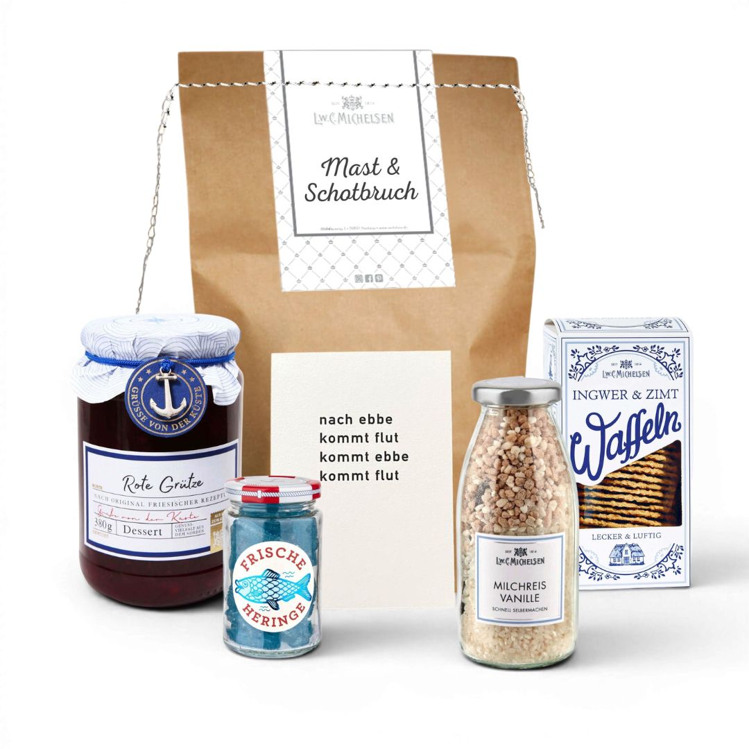 Geschenktüte „Mast & Schotbruch" mit Rote Grütze, Frische Heringe, Milchreis Vanille und Ingwer-Zimt-Waffeln