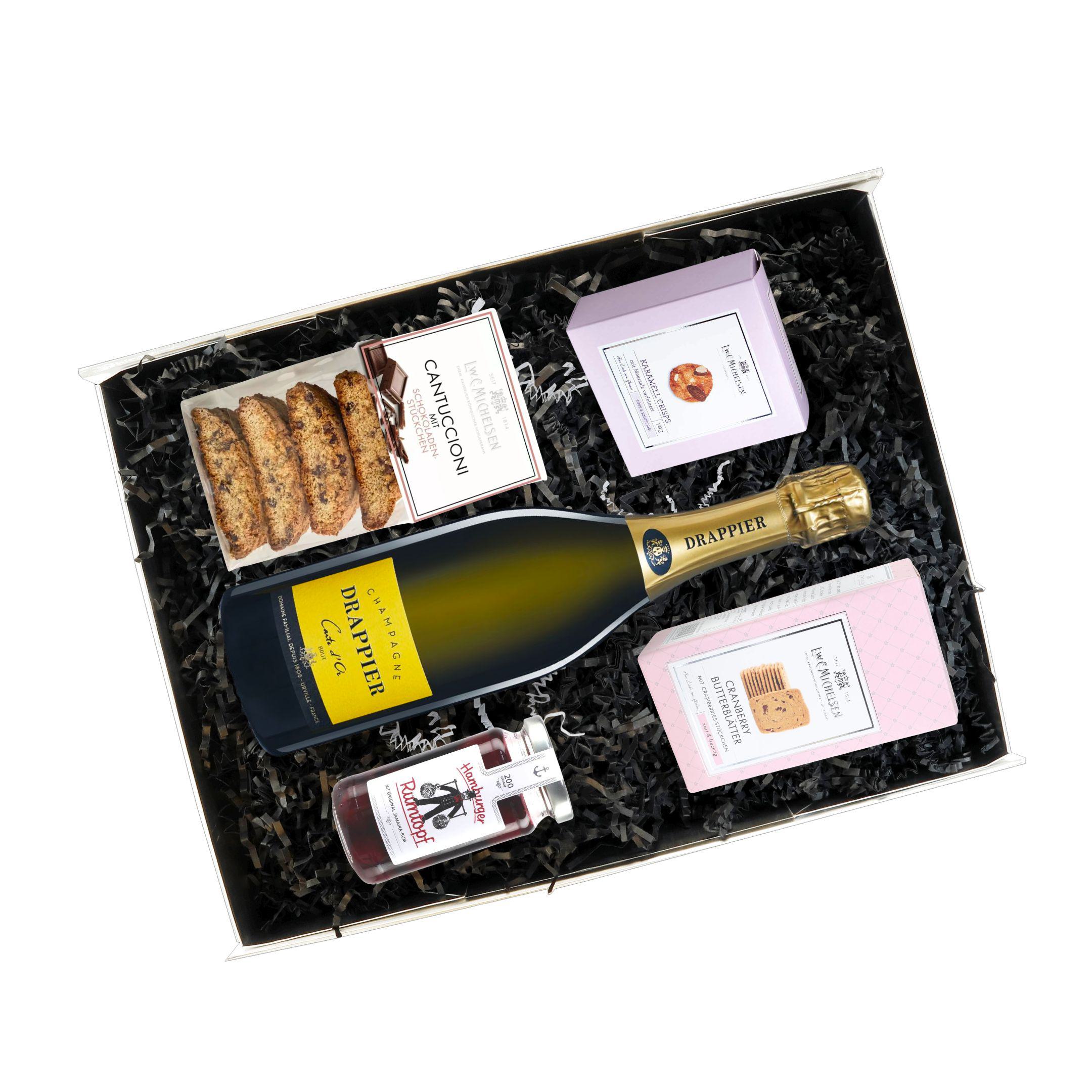 Geöffnete Geschenkbox mit Champagne Drappier & Gebäck