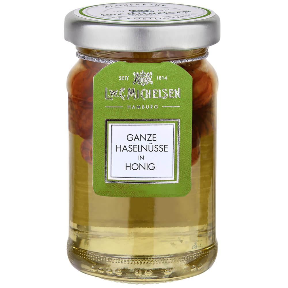 Haselnüsse in Honig -klein-: Unsere Haselnüsse in Honig von L.W.C. Michelsen sind eine wahre Delikatesse, die die Süße des...