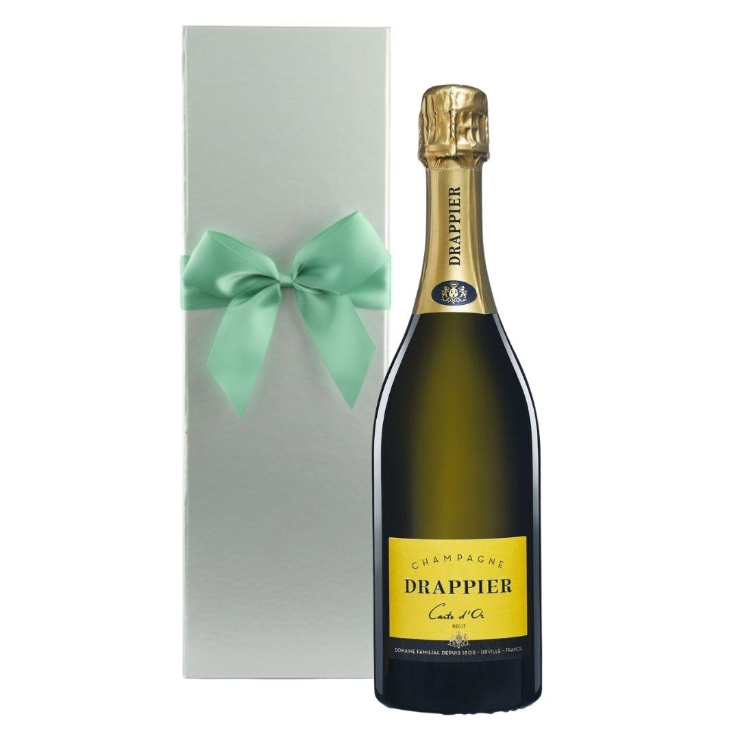Champagne Drappier Carte d'Or Brut in silberner Magnetbox mit grüner Schleife